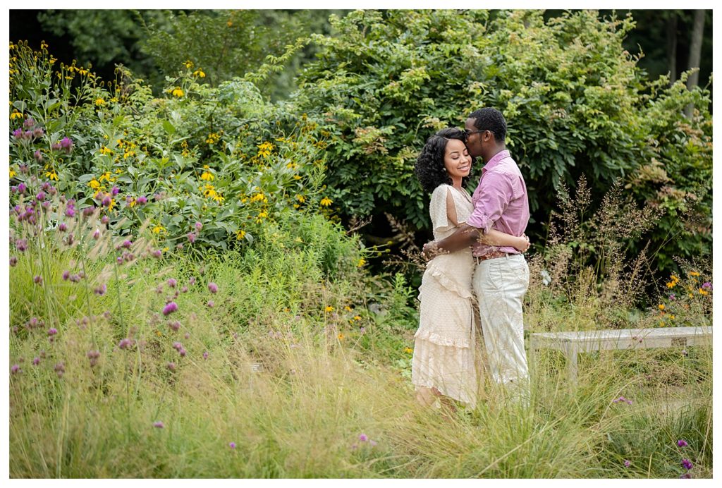 Brookside Gardens outdoor engagement session of an African American couple.