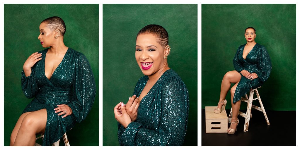 Posed African American women in a studio session on a green background in a green dress for the 40 over 40 portrait project