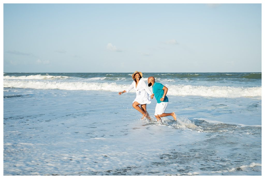 African American couple during their gorgeous beach engagement session
