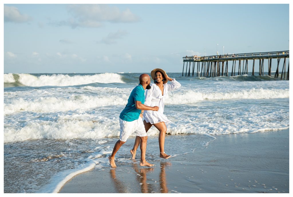 Couple on the beach during their gorgeous engagement session in Ocean City, MD