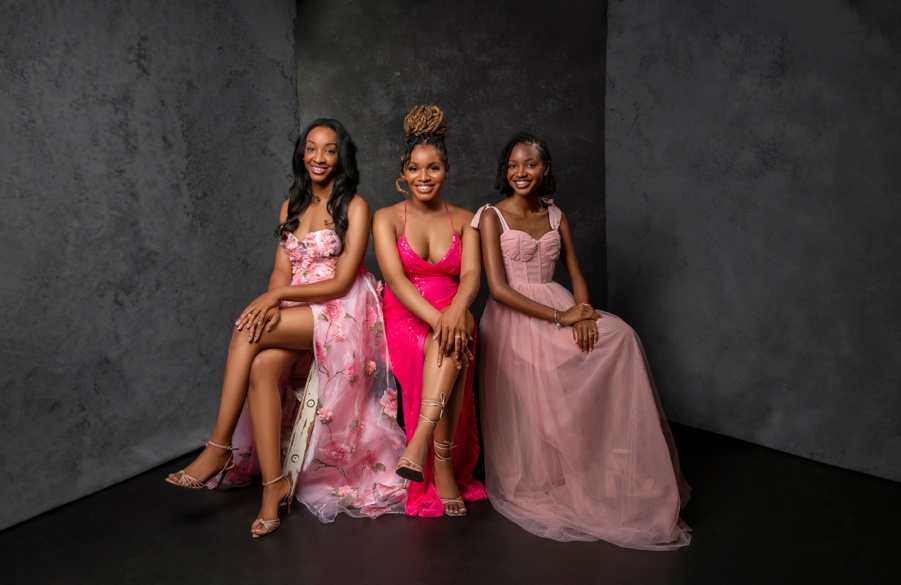 African American mother with her two young adult daughters during a studio mother/daughter portrait session in Alexandria, VA.