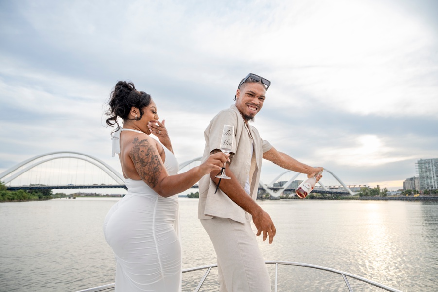 Couple champagne spray on the Potomac